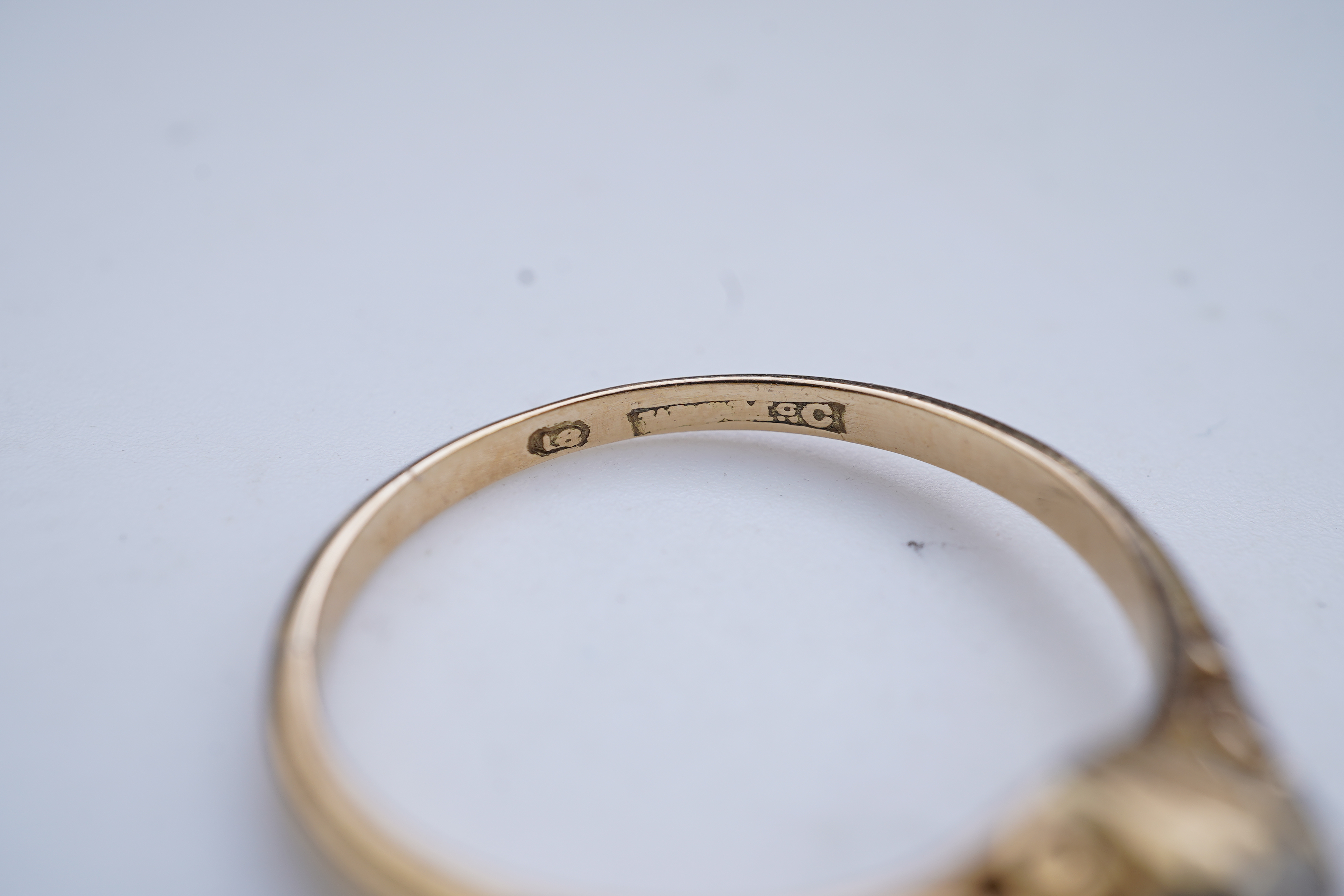 A gold and diamond ring, early 20th century